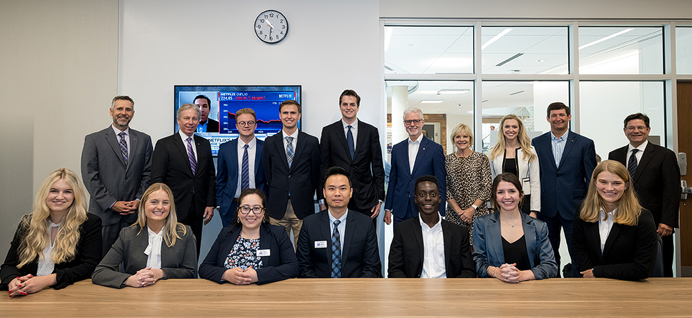 Students and faculty with Phillip Green