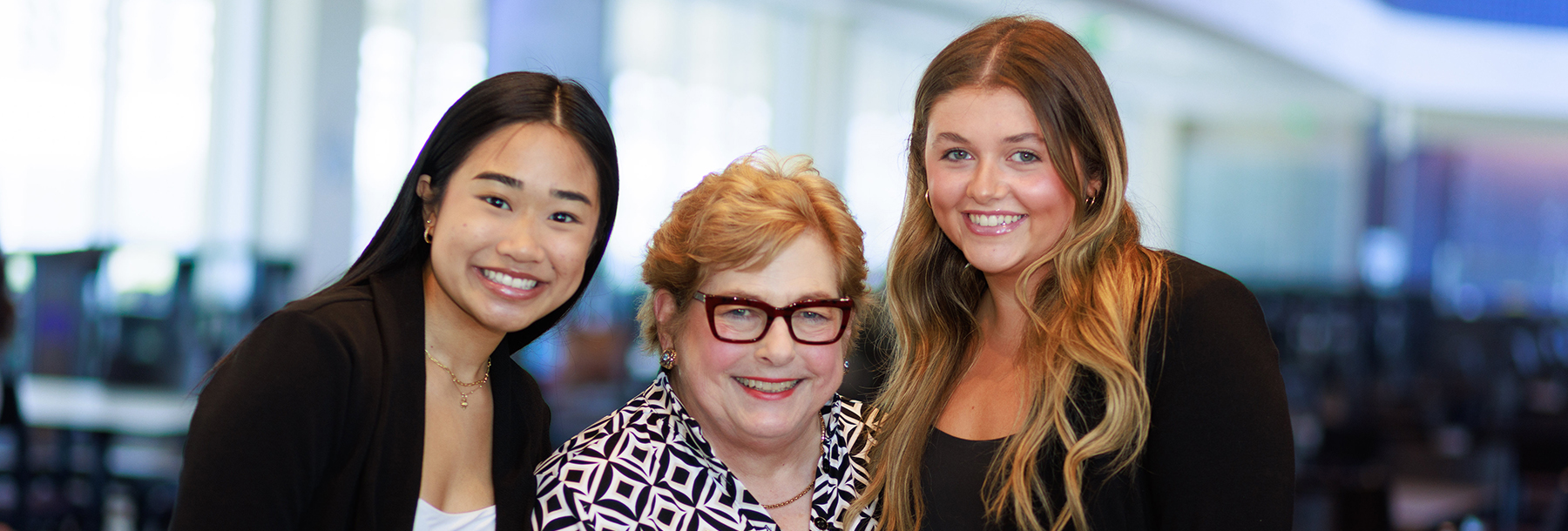Section Image: Woman mentor with two female student mentees 