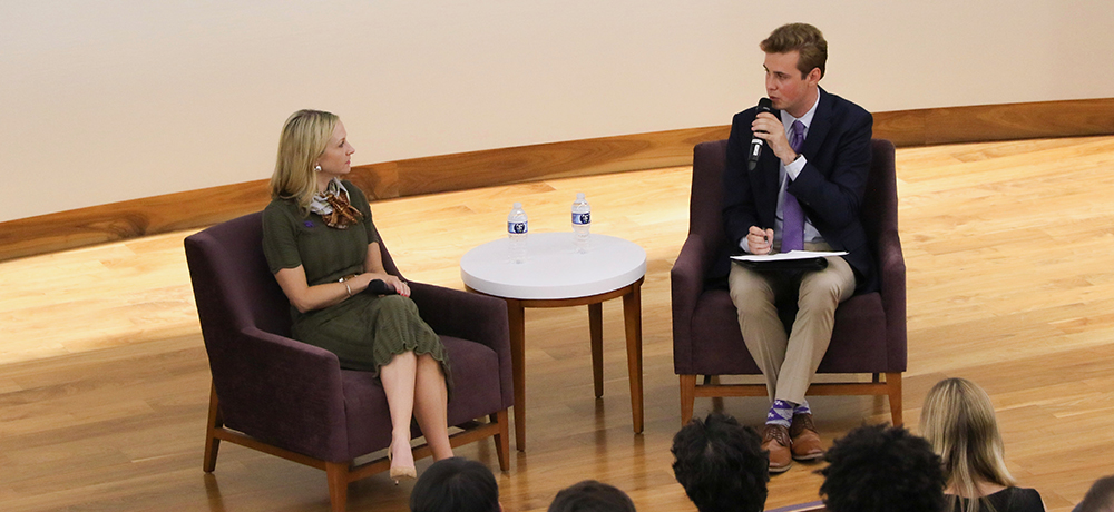 Mayor Parker and Wesley Hill on the stage in the Shaddock Auditorium