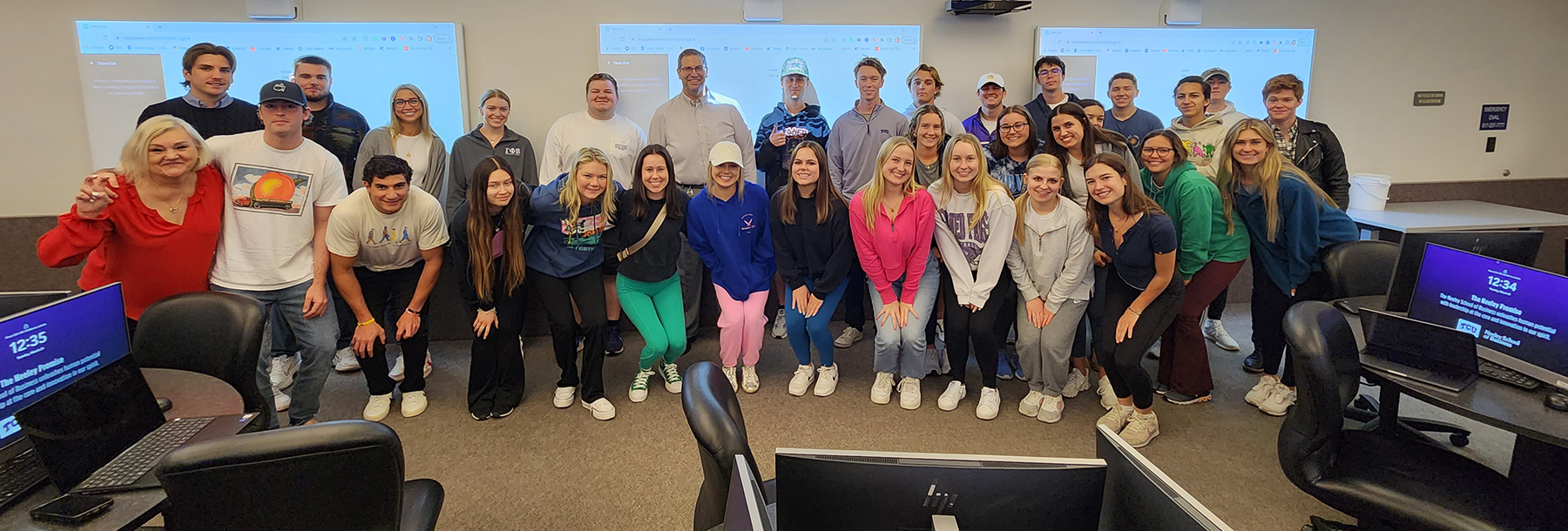 Section Image: Beata Jones with her classroom in the BIS lab 