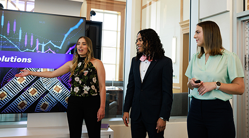 Section Image: Group of students presenting in the Rees Jones Incubator Lab 