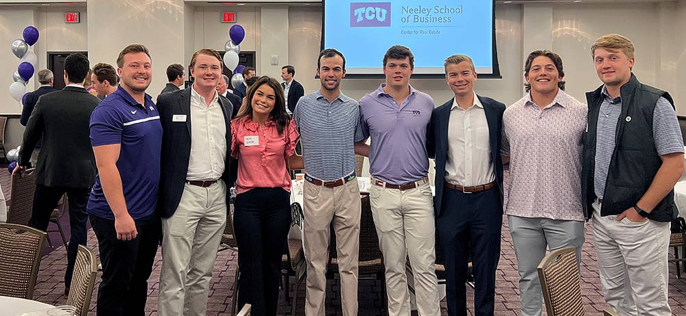 Section Image: Students giving a presentation in a classroom. 