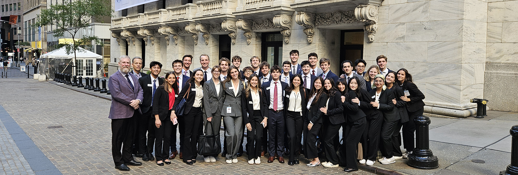 Section Image: A group of Neeley Fellows at outside the NYSE 