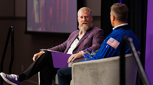 Section Image: Chris Cassidy and Craig Crossland on stage in the BLUU ballroom 