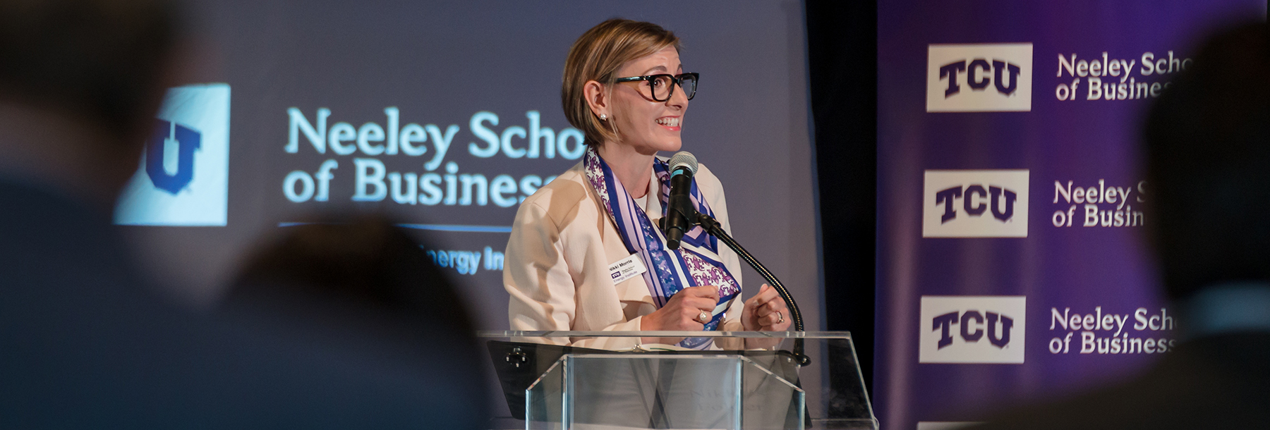 Section Image: Nikki Morris addresses the audience at the Energy Symposium 