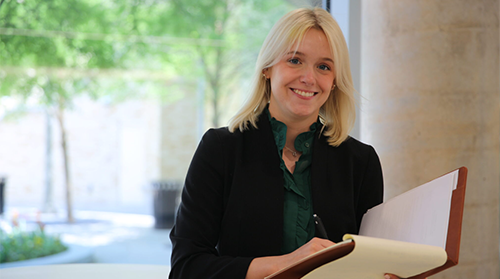 Neeley Leader with notebook