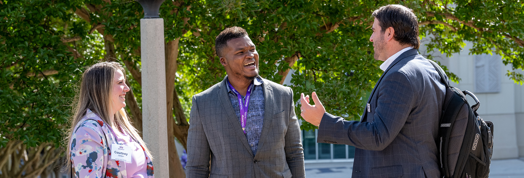 Section Image: Energy Symposium attendees network on campus 