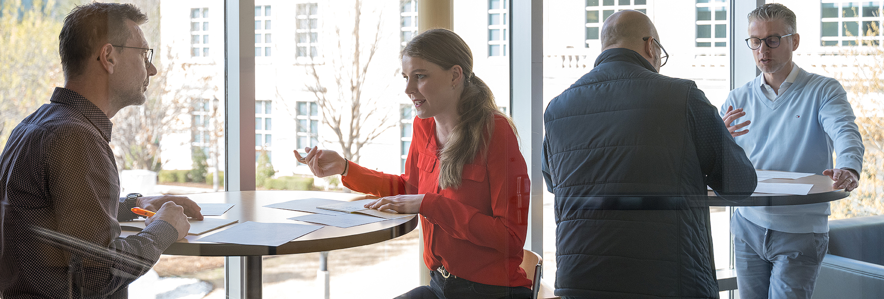 Section Image: Program participants connect in the Executive Programs Lounge 