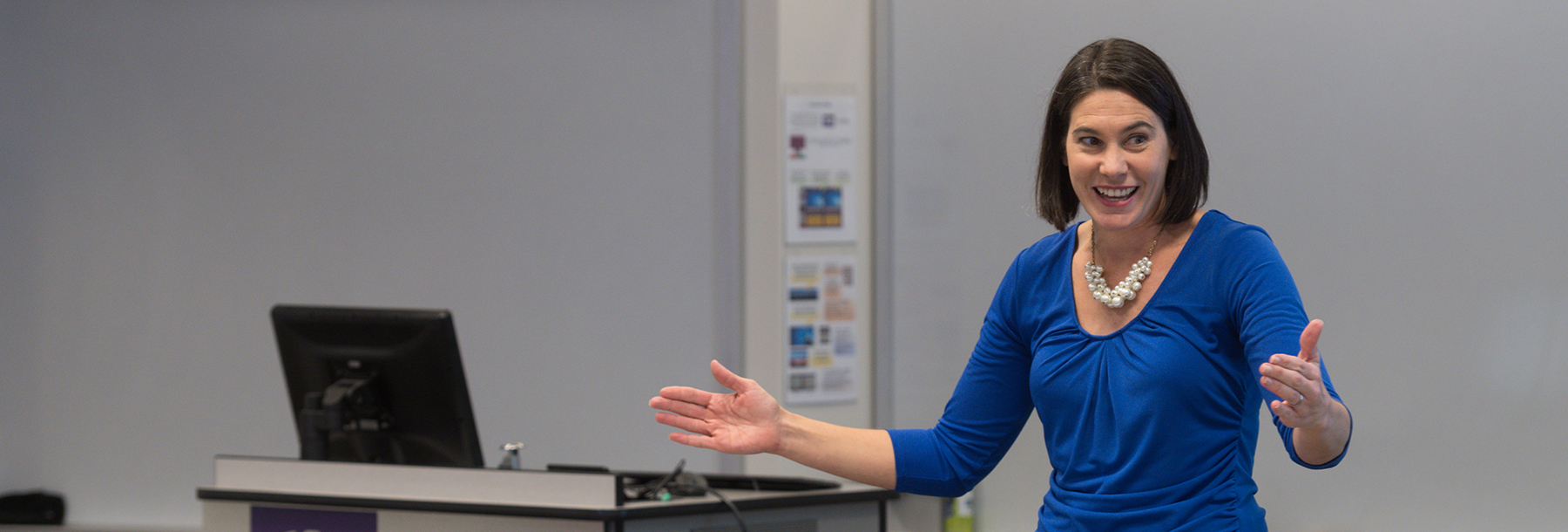 Section Image: Renee Olvera teaching in a classroom 