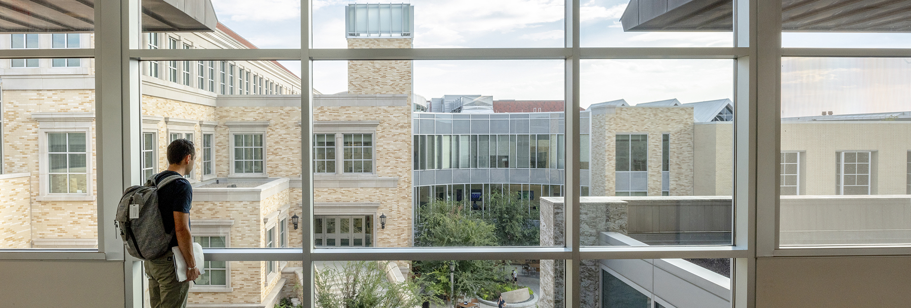 Section Image: Student looking at view of Neeley School of Business 