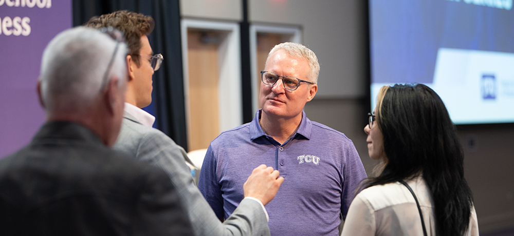 Eric Artz speaking with students