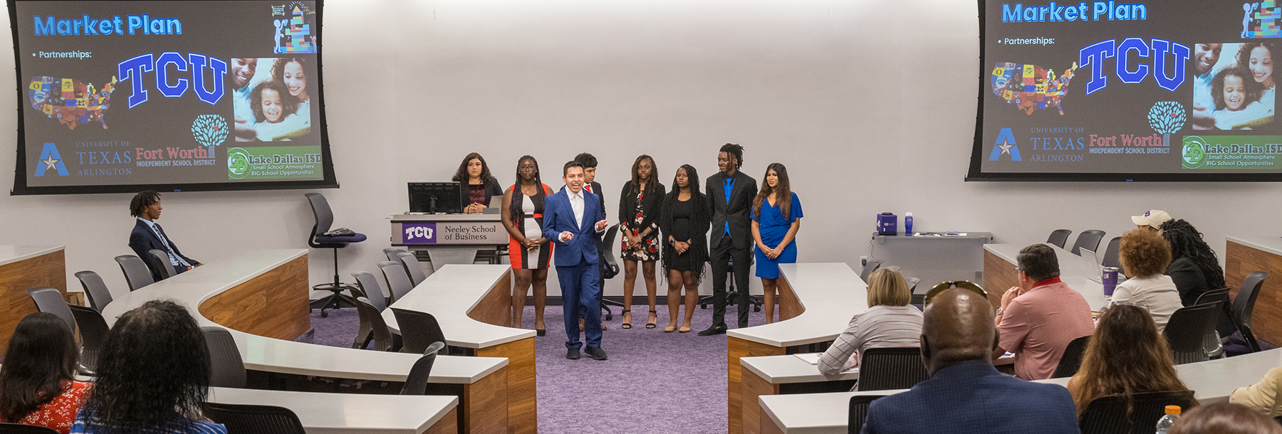 Section Image: Student wearing a TCU visor. 