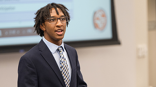 African American student giving a presentation