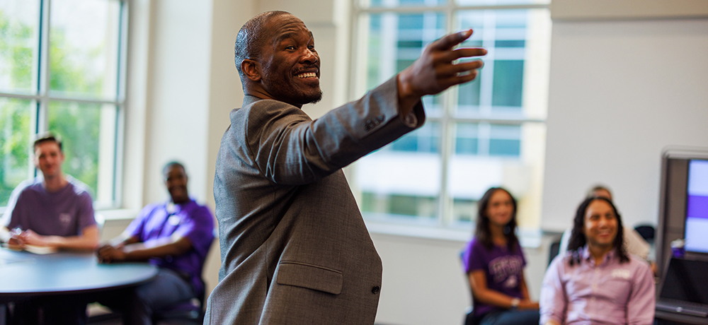 Section Image: Elijah Clark teaching in a Smart Classroom 